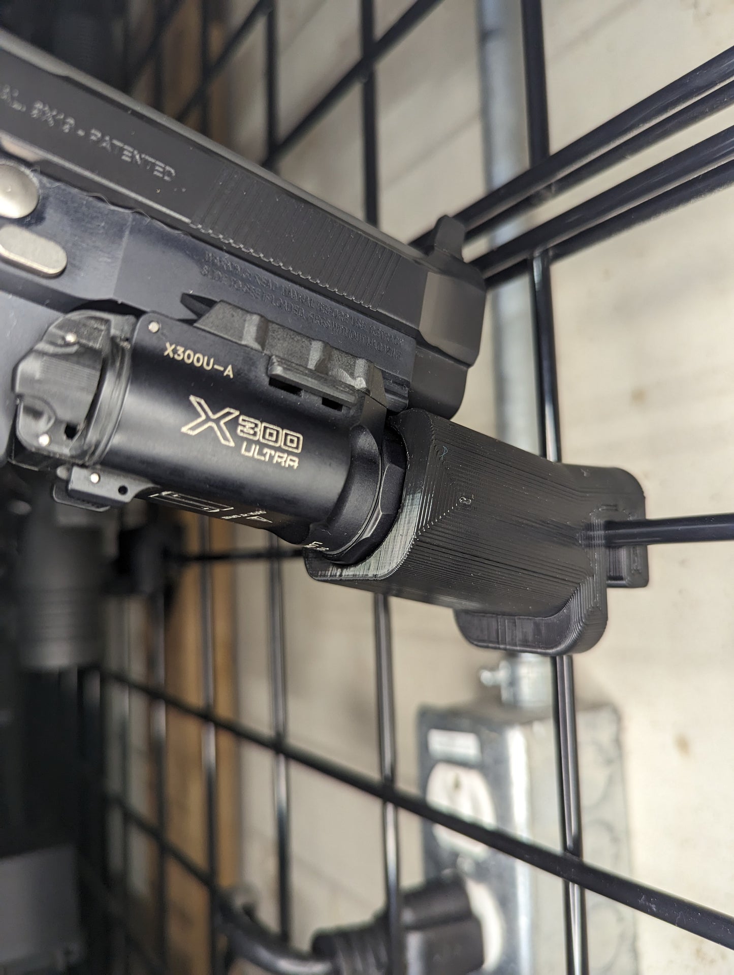 Pistol Mount via Surefire X300 - Gridwall | Gear Holder Storage Rack