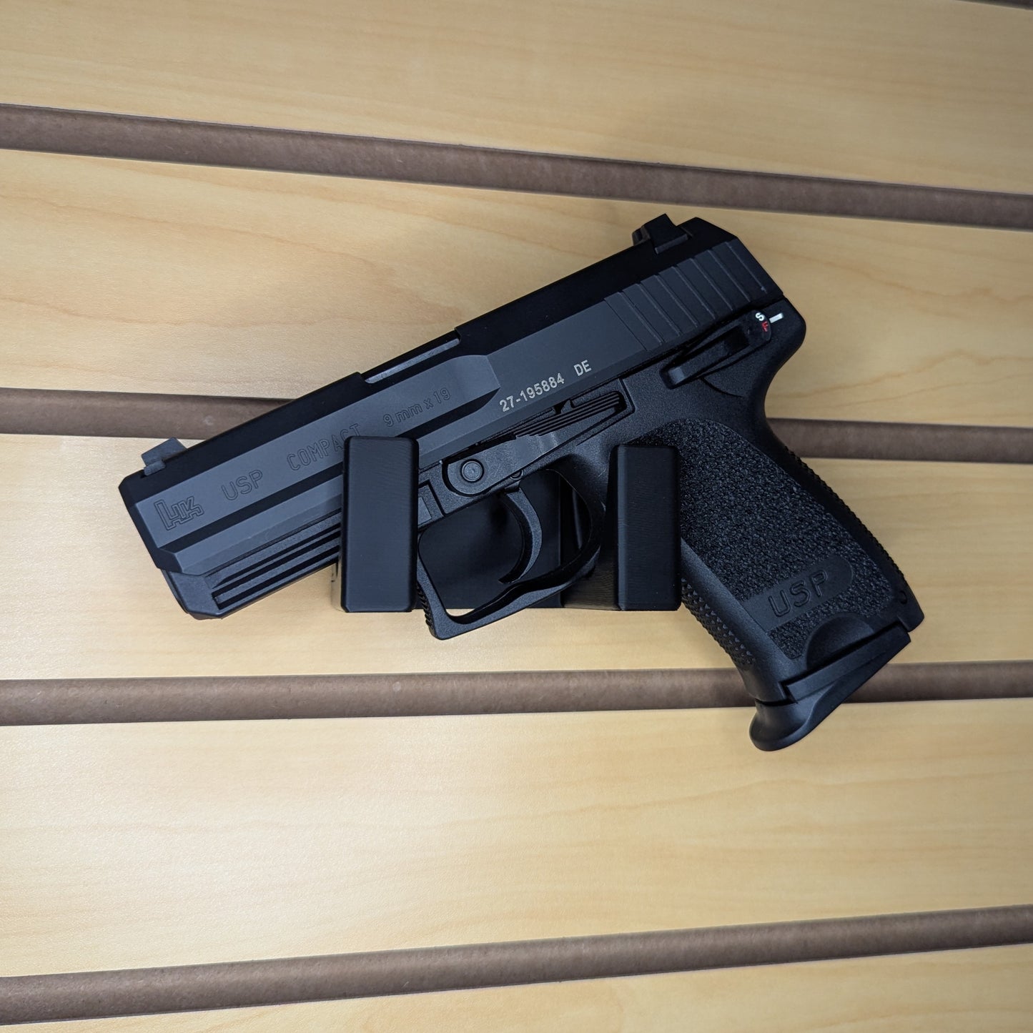 Universal Pistol Mount - Cradle Version - Slatwall | Handgun Holder Storage Rack